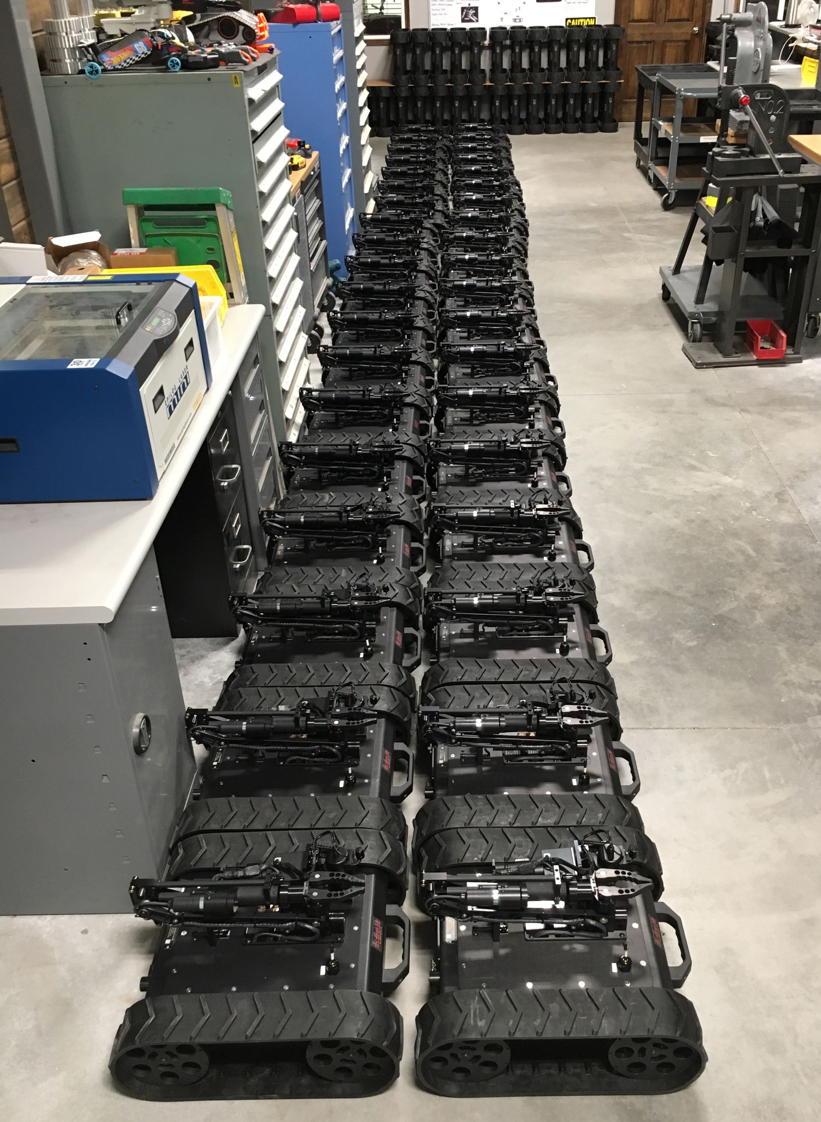 Explosive ordinance robots lined up